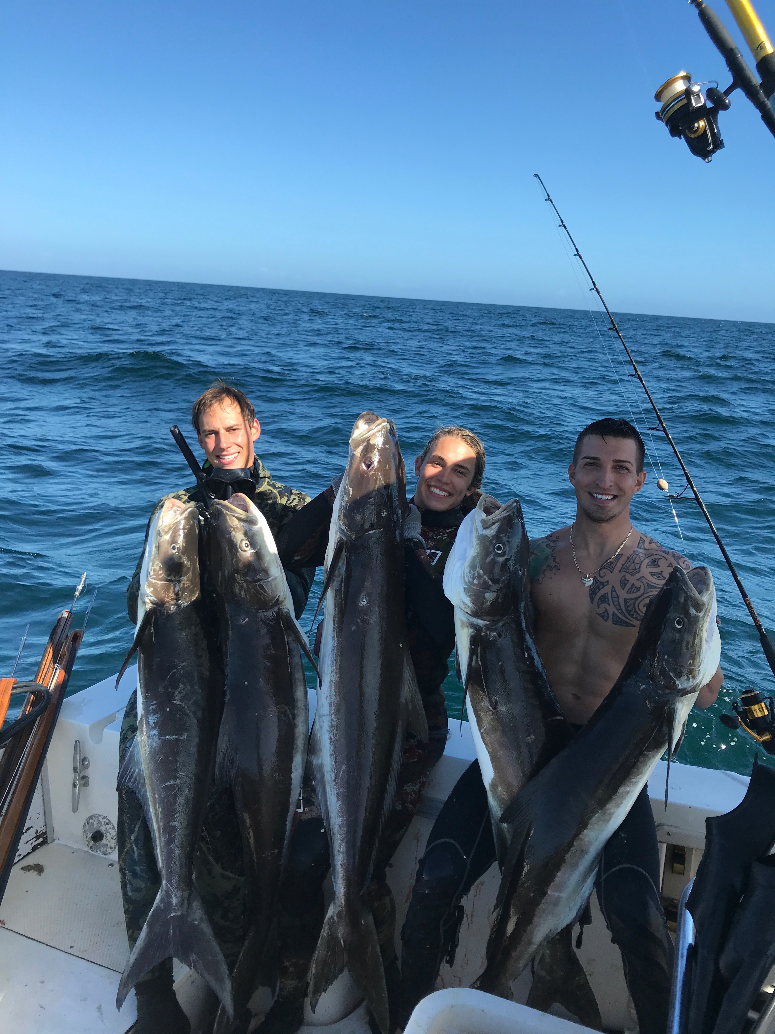 Happy group with cobia catch
